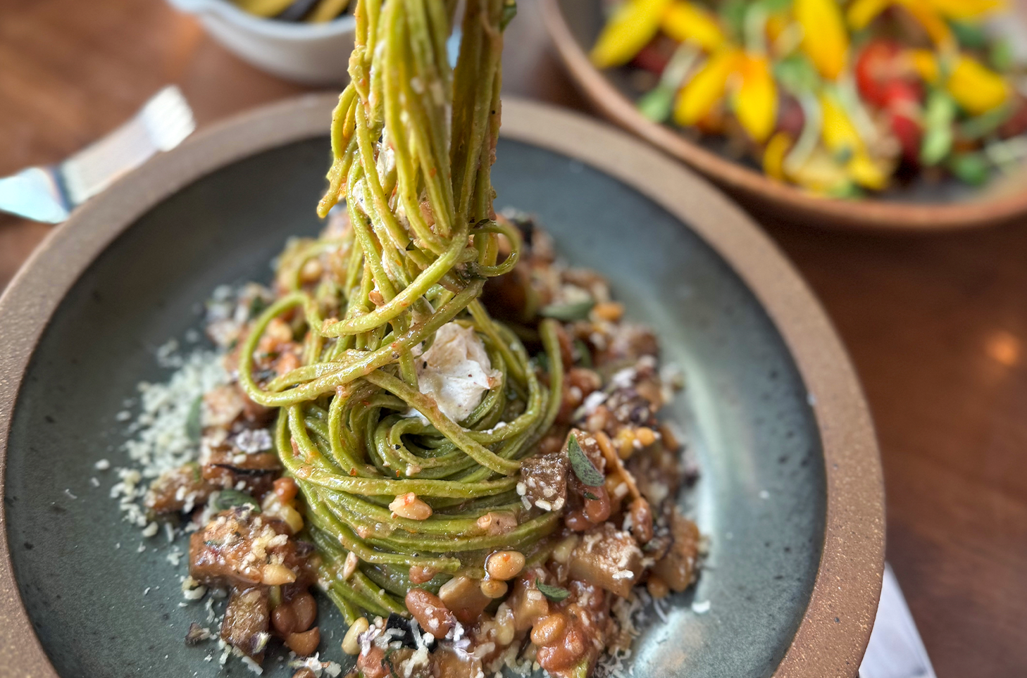 tomato leaf pasta spaghetti in ceramic bowl