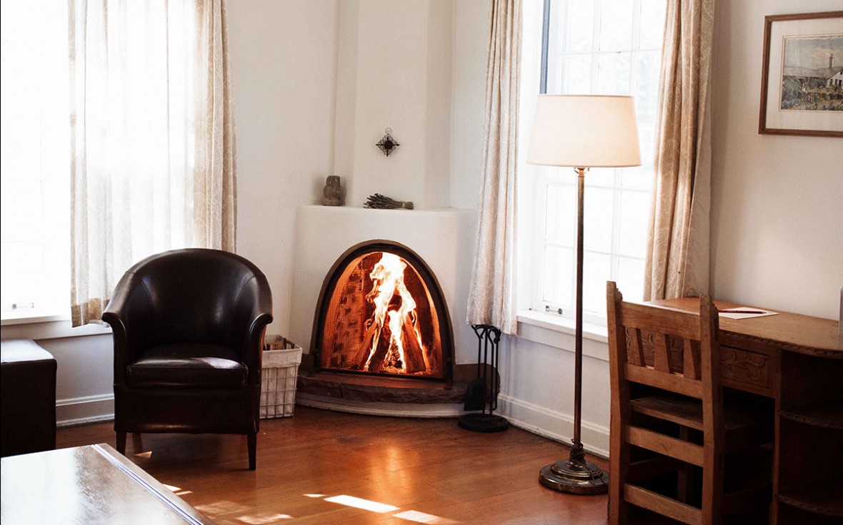 wood burning fireplace in room