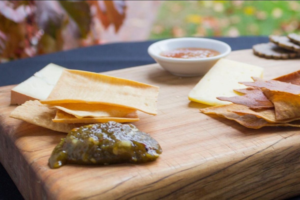 cracker and cheese spread featuring green chili jam