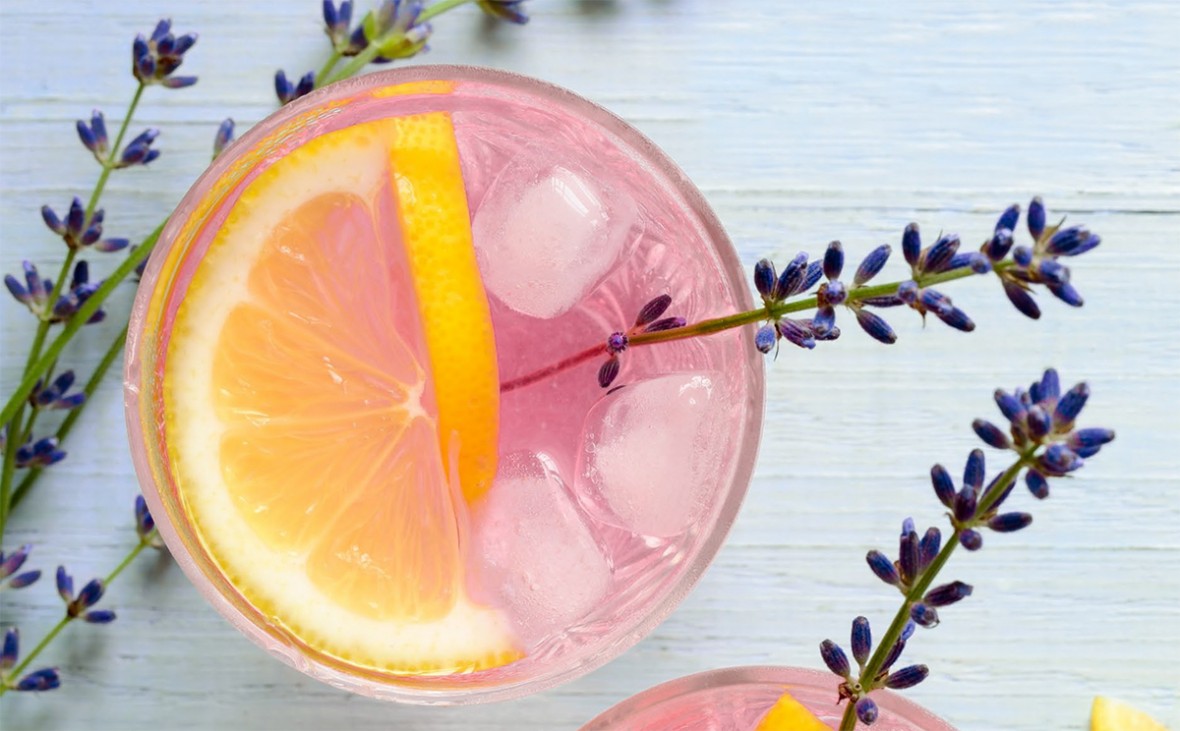 lemonade close up in glass with lavender garnish