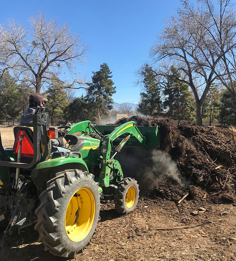 tractor dumping dirt