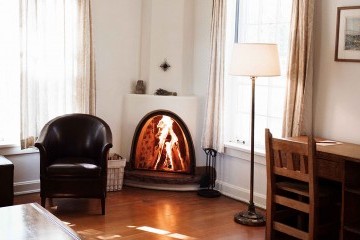 wood burning fireplace in room