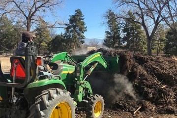tractor dumping dirt